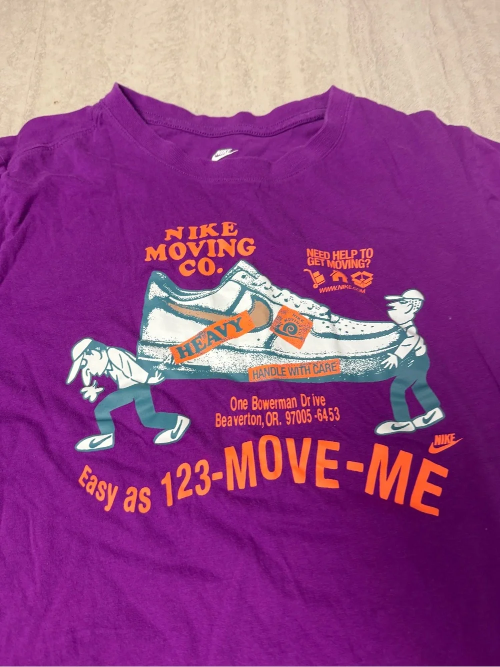 The Nike Tee Moving Day graphic tee shirt